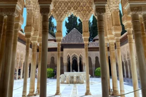 The Court of the Lions in the Alhambra of Granada, with its arcade of slender columns