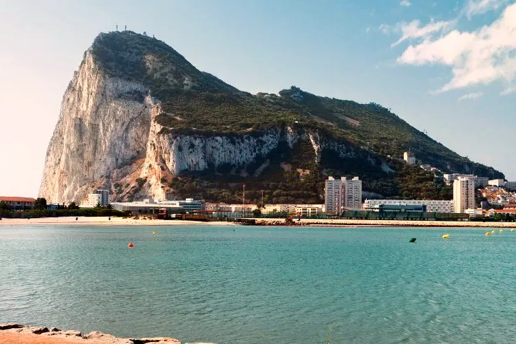 The Rock of Gibraltar seen across the water from the beach